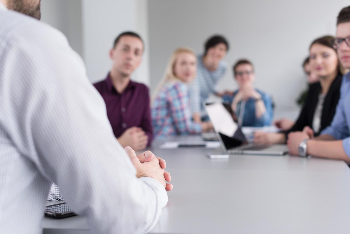 Business Team At A Meeting at modern office building photo