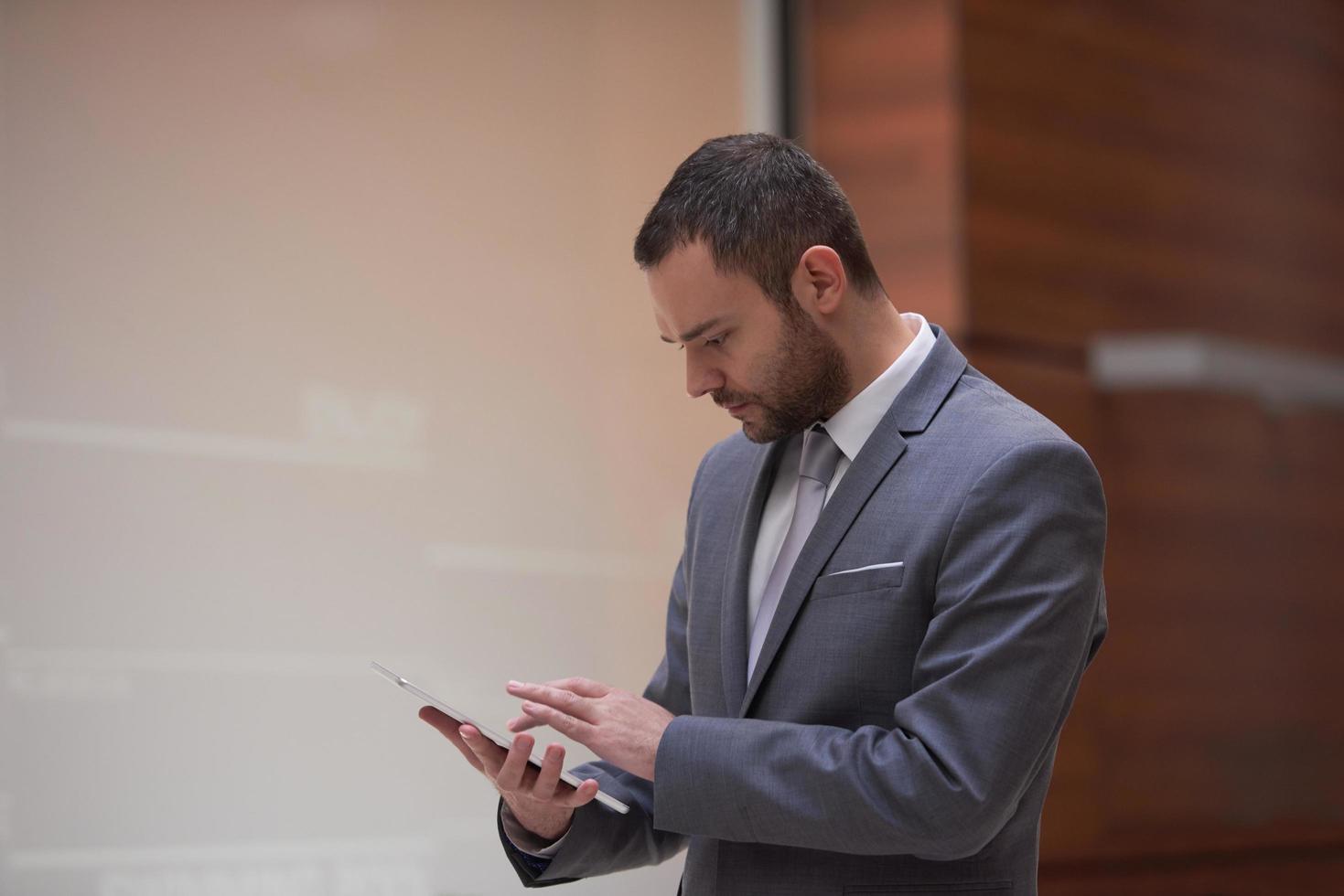 business man with tablet photo
