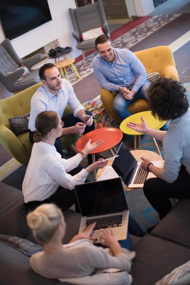 Startup Business Team At A Meeting at modern office building photo
