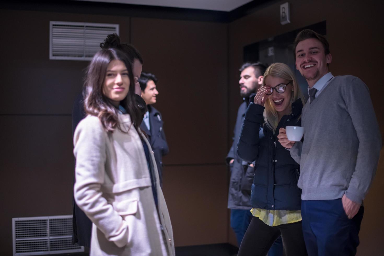 multiethnic startup business team having a coffee break photo