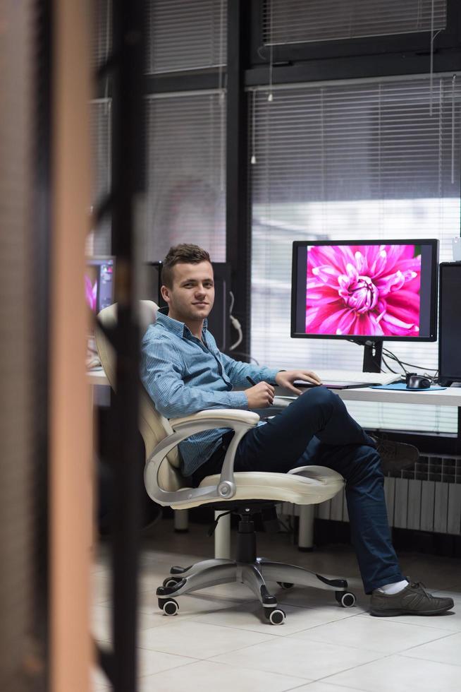 photo editor at his desk