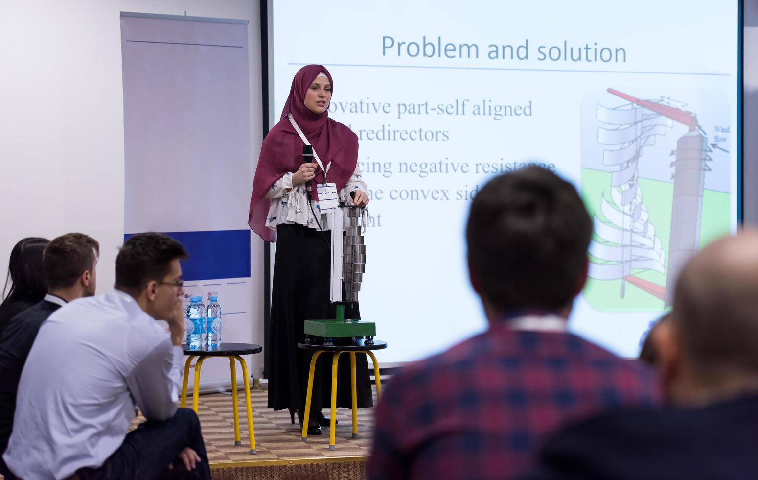 Muslim businesswoman giving presentations photo