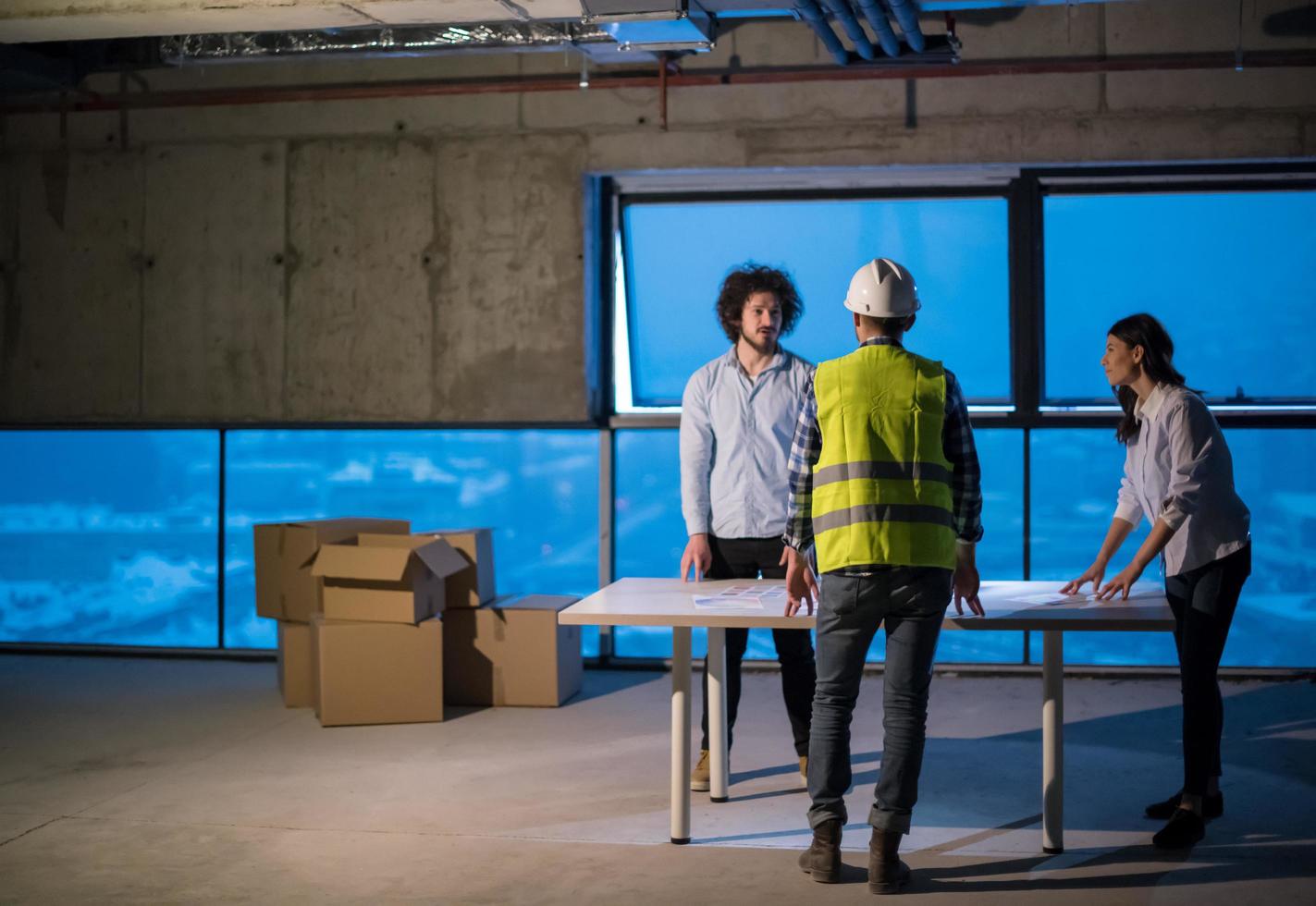 business people in group, architect and engineer on construction site photo