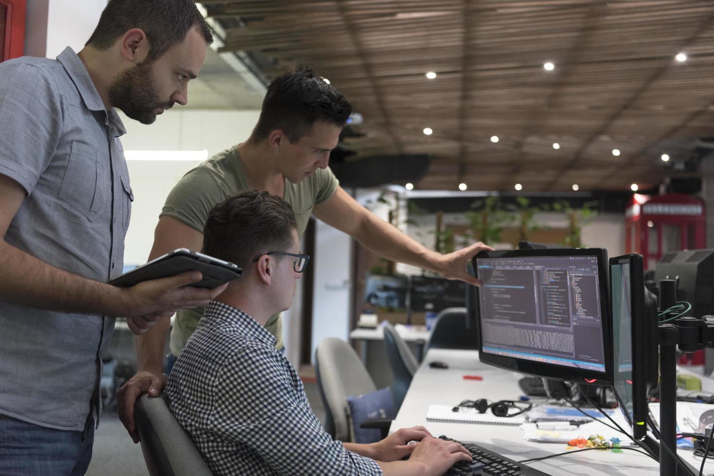 startup business people group working as team to find solution photo
