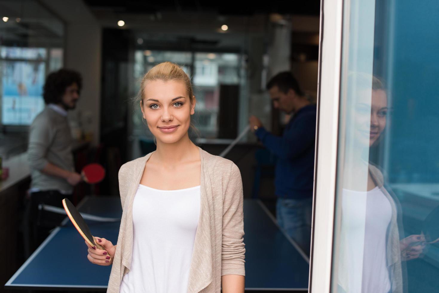 startup business team playing ping pong tennis photo