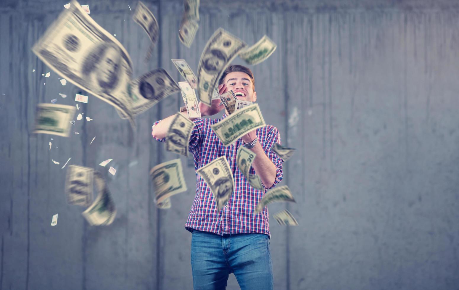 businessman making the rain of money photo