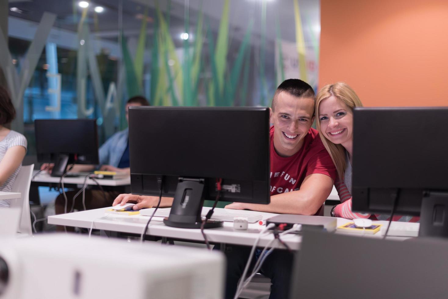 technology students group working in computer lab school  classroom photo