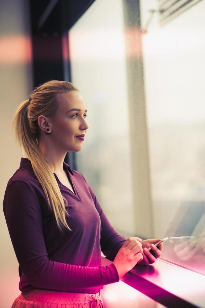 business woman using smart phone at office photo