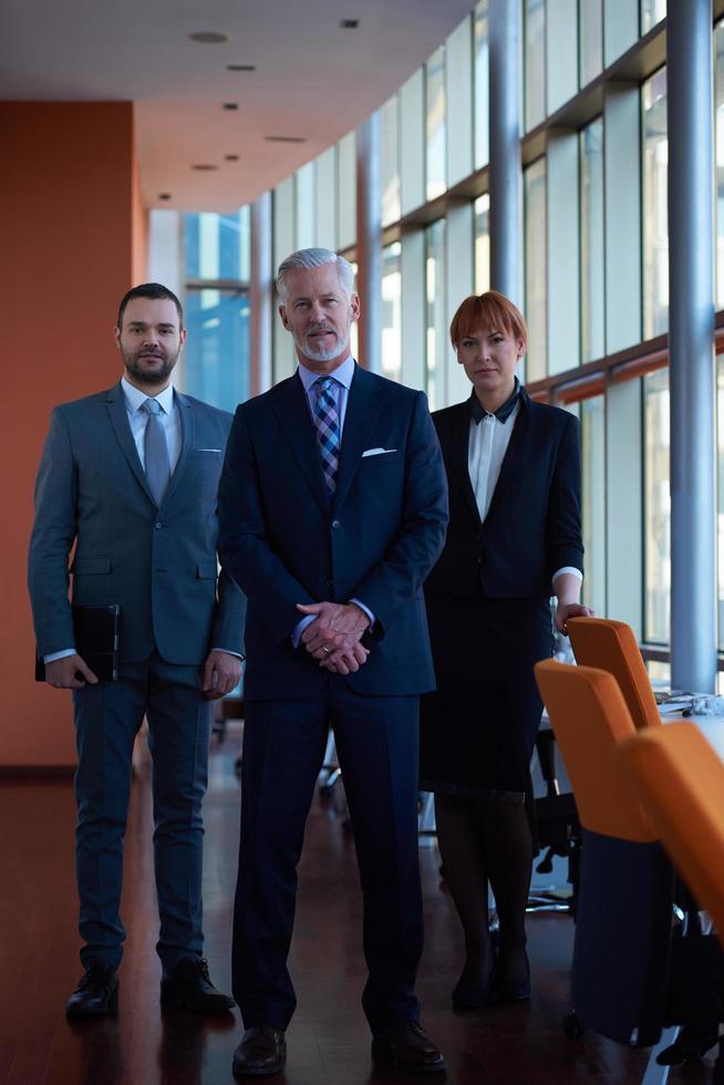 senior business man with his team at office photo