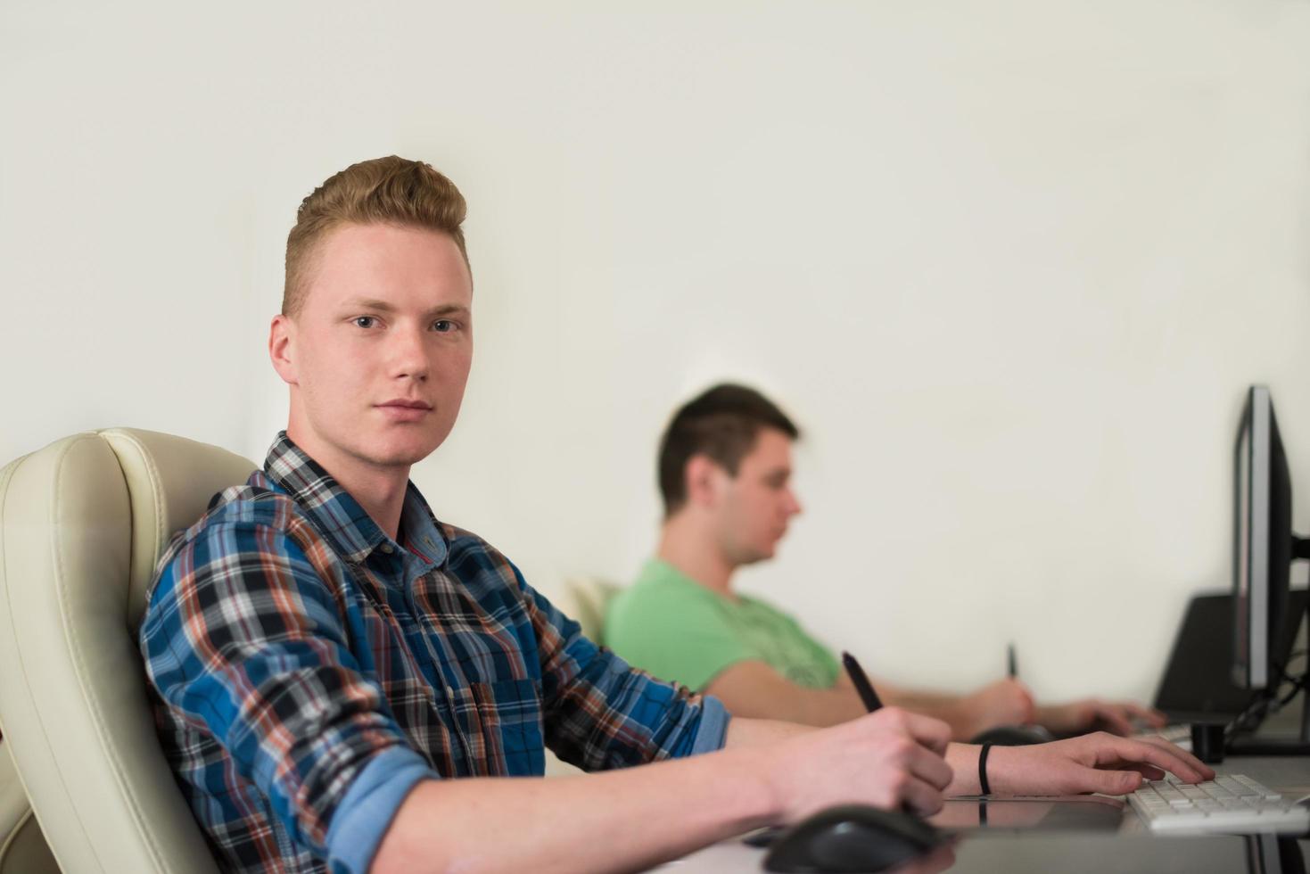 a group of graphic designers at work photo
