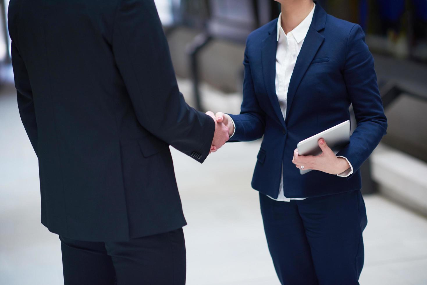 business man and woman hand shake photo