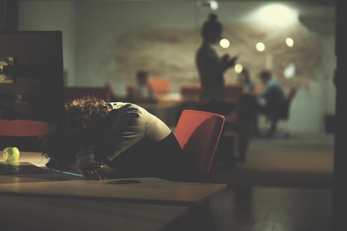 businessman relaxing at the desk photo