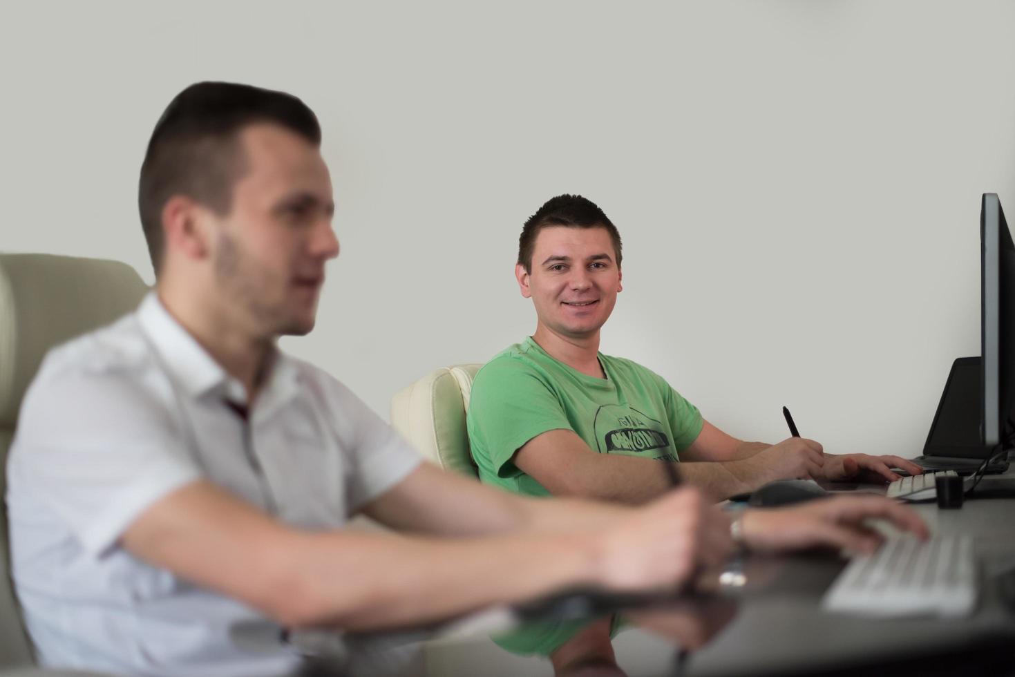 a group of graphic designers at work photo