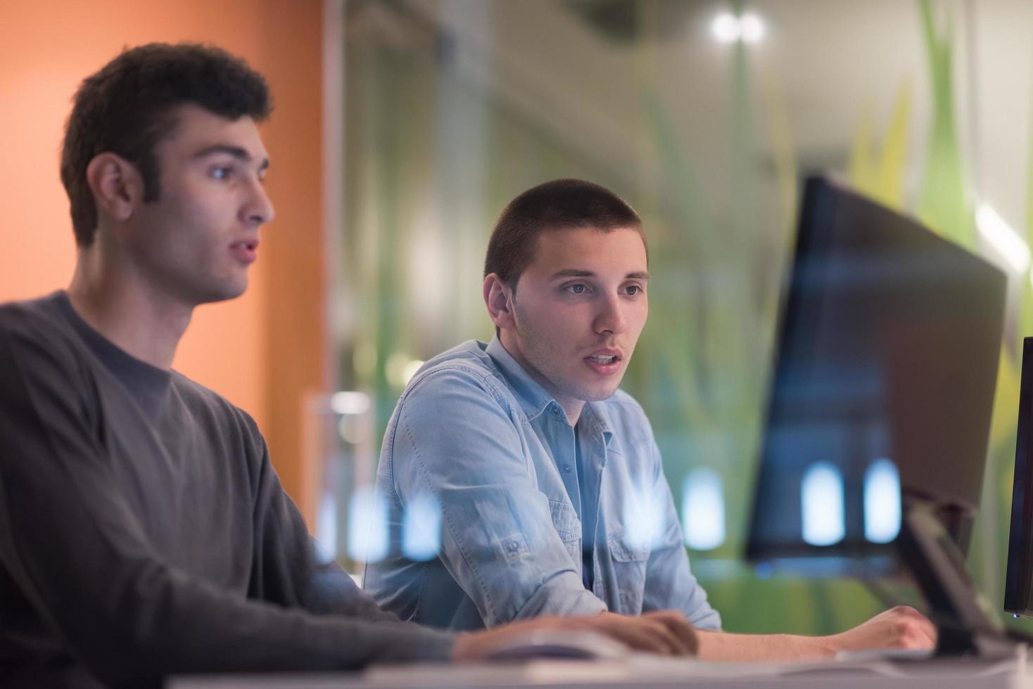 technology students group working  in computer lab school  classroom photo
