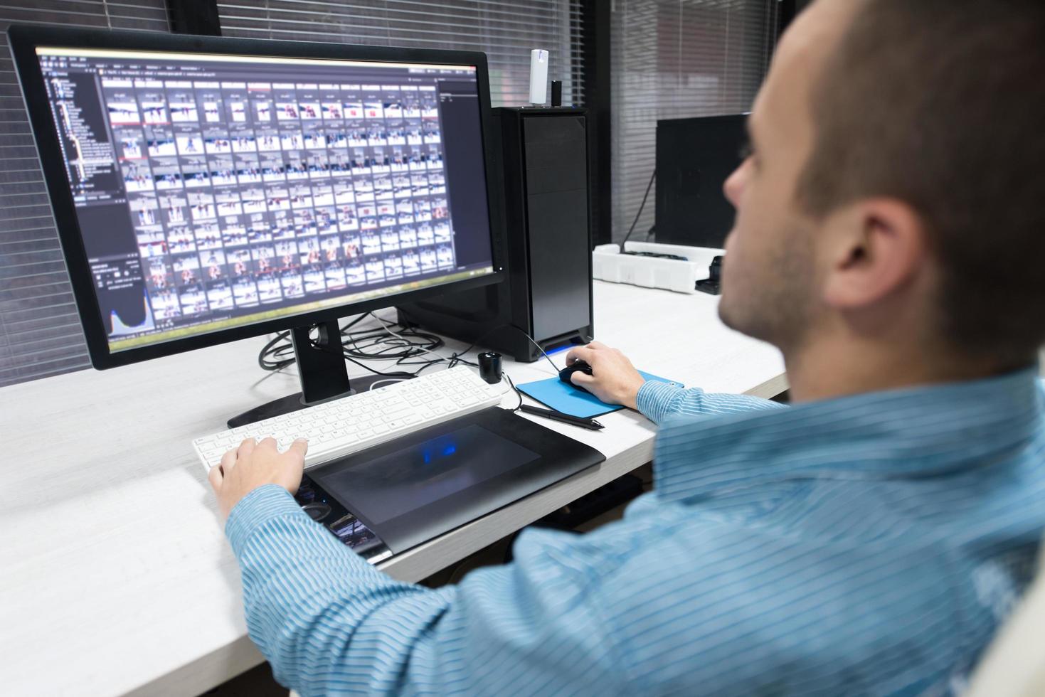 photo editor at his desk