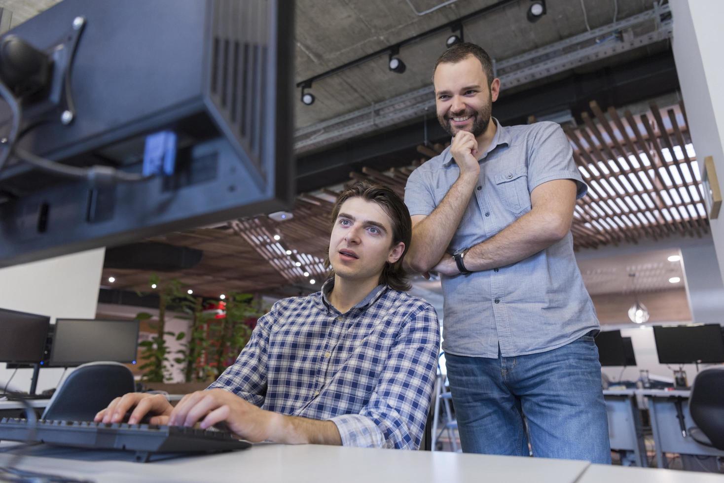 startup business people group working as team to find solution photo