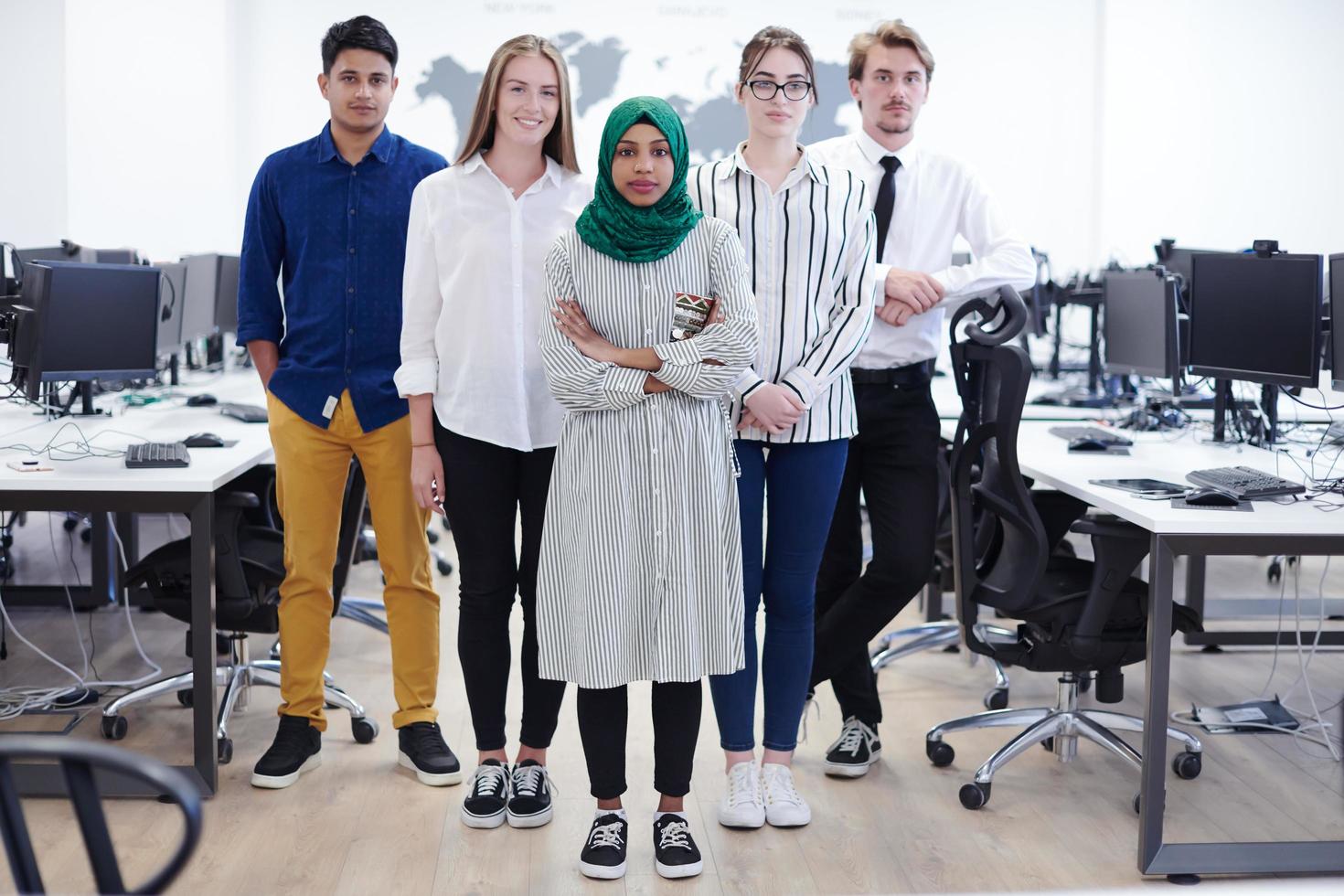 portrait of young excited multiethnics business team photo