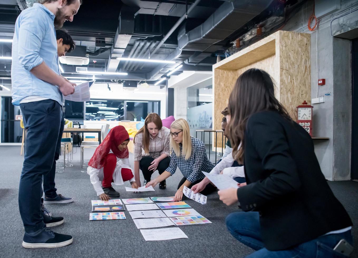 black muslim woman having meeting with Multiethnic  startup business team photo