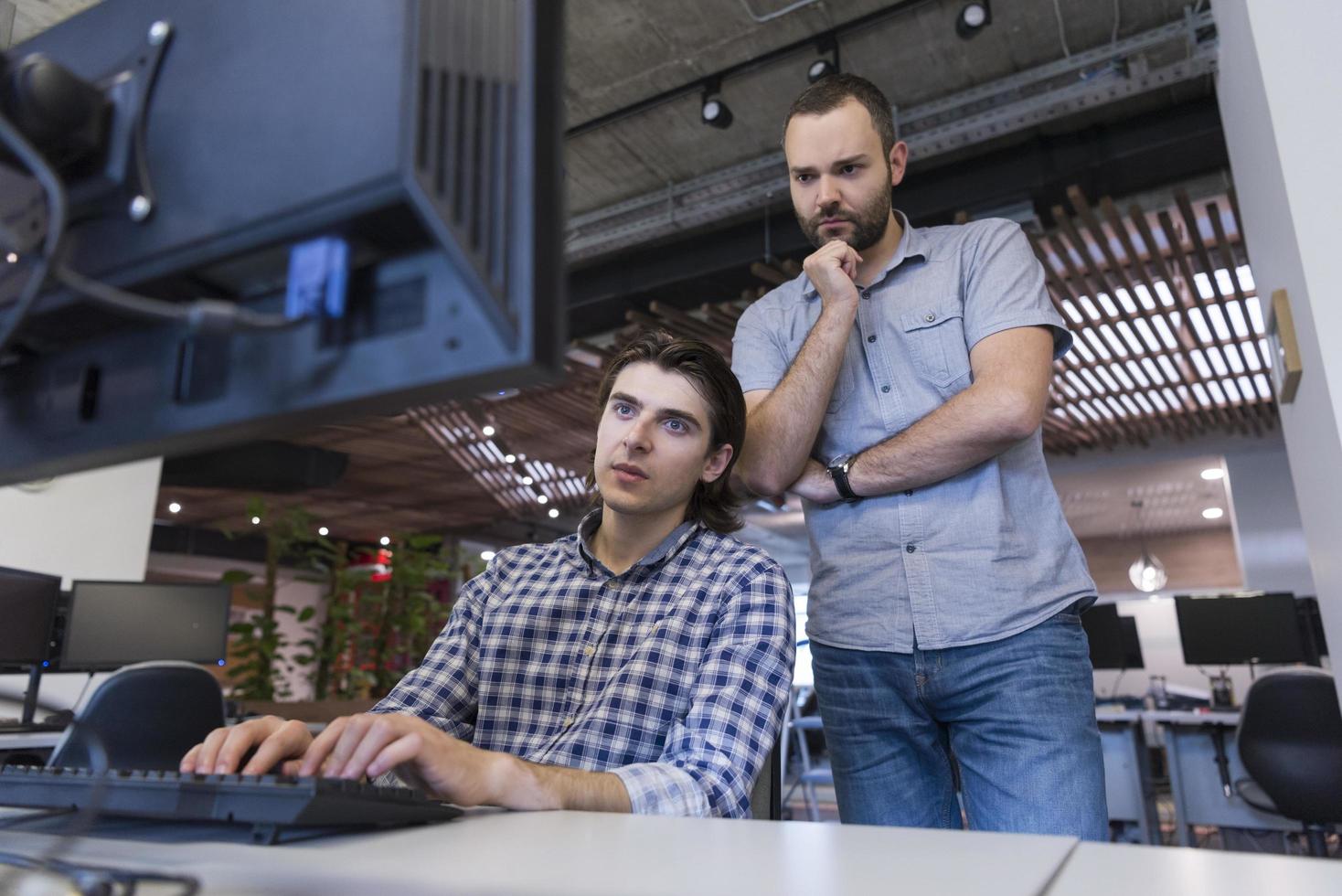 startup business people group working as team to find solution photo