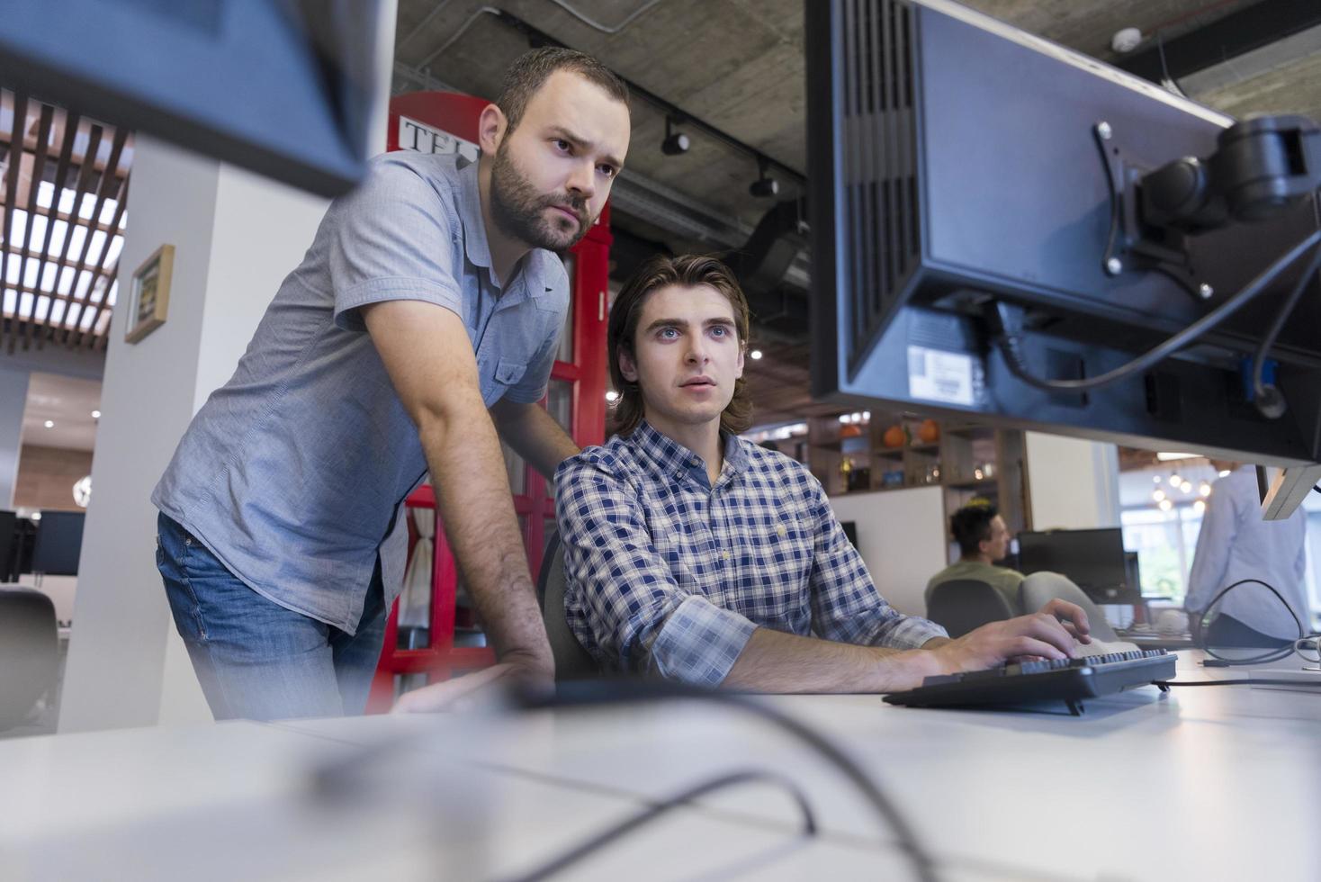 startup business people group working as team to find solution photo