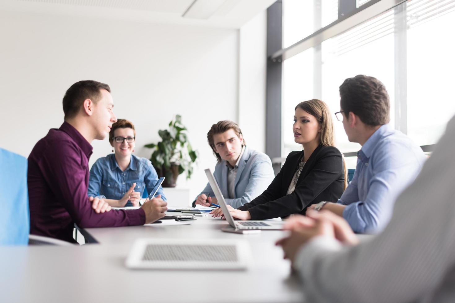 Business Team At A Meeting at modern office building photo