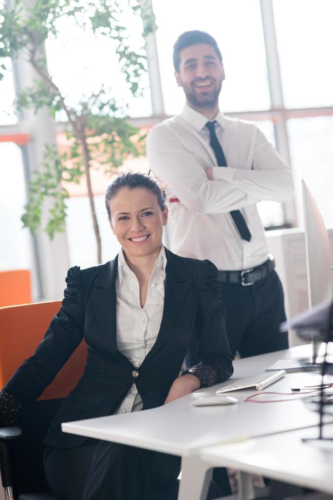 portrait of business couple at office photo
