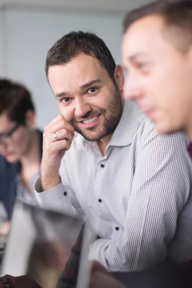 Business Team At A Meeting at modern office building photo