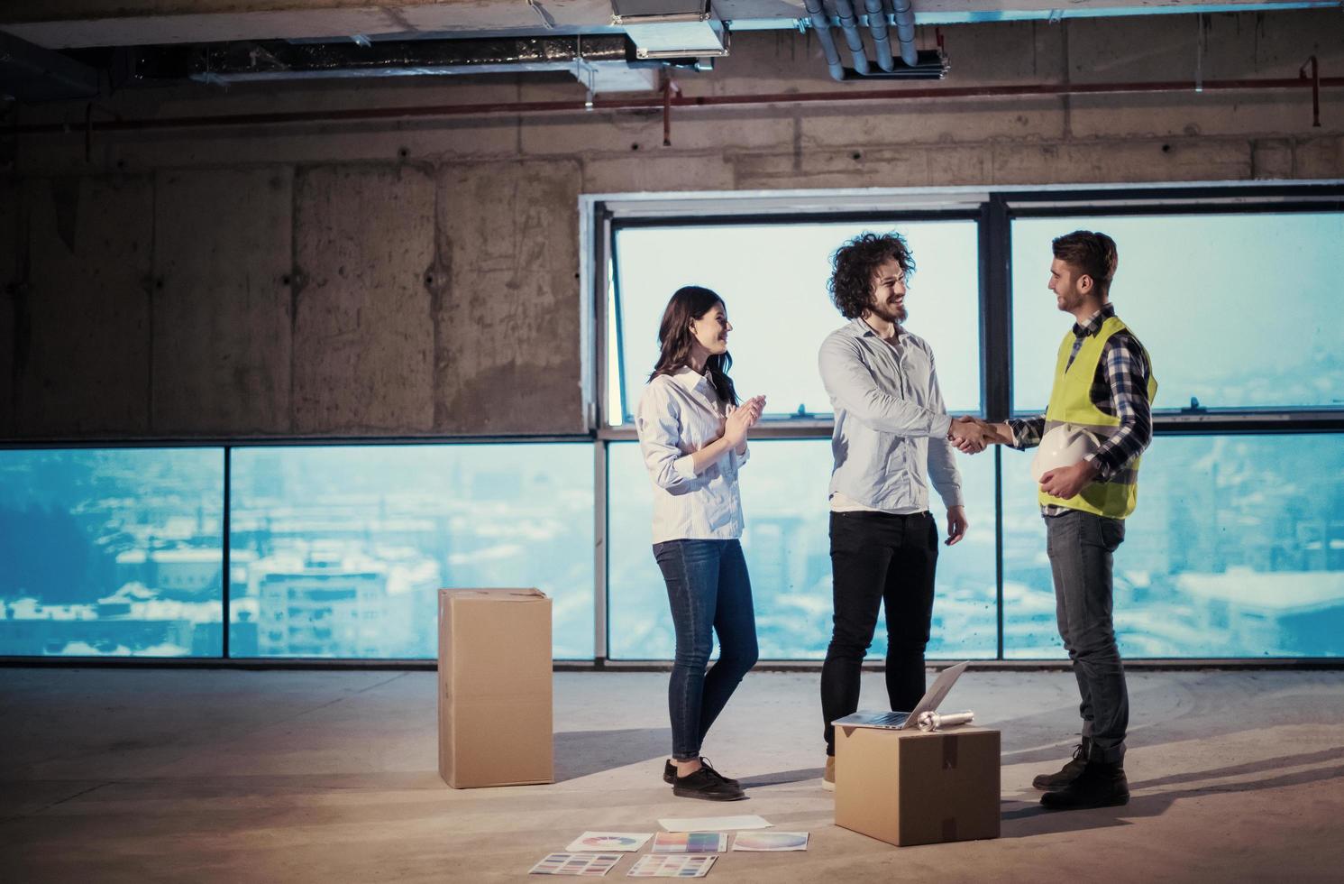 business people in group, architect and engineer on construction site photo