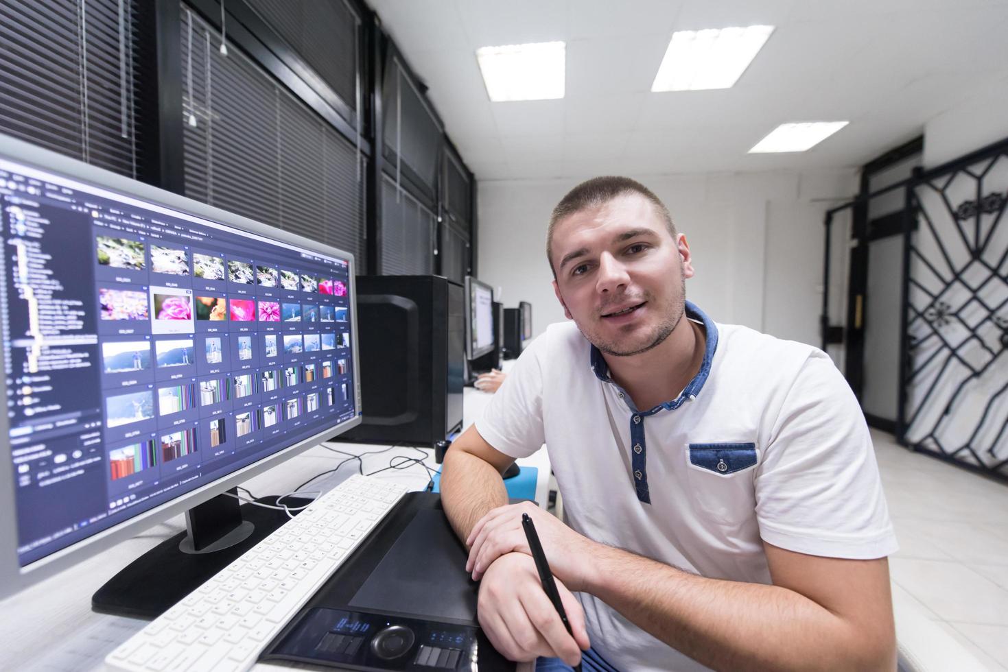 photo editor at his desk