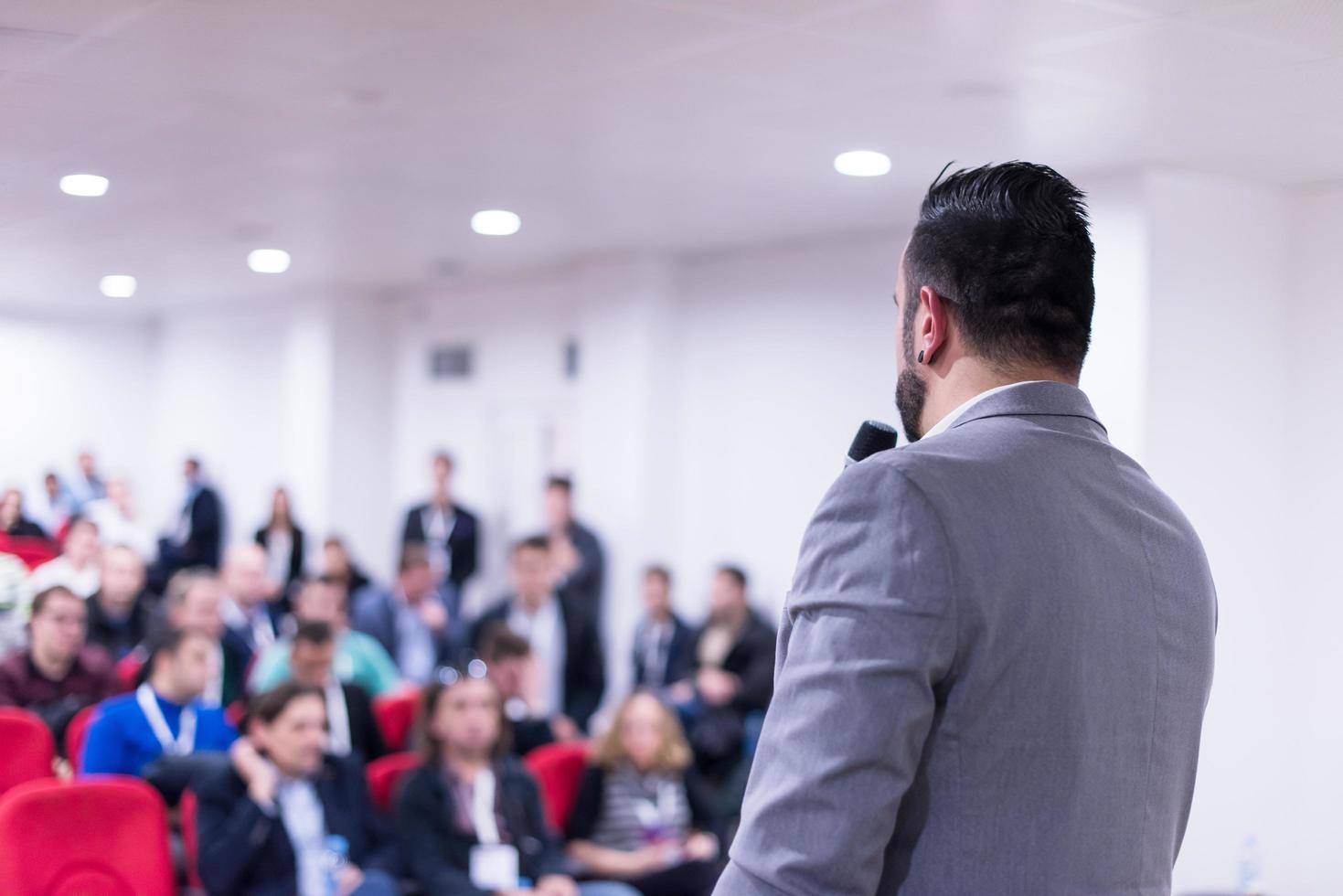 successful businessman giving presentations at conference room photo