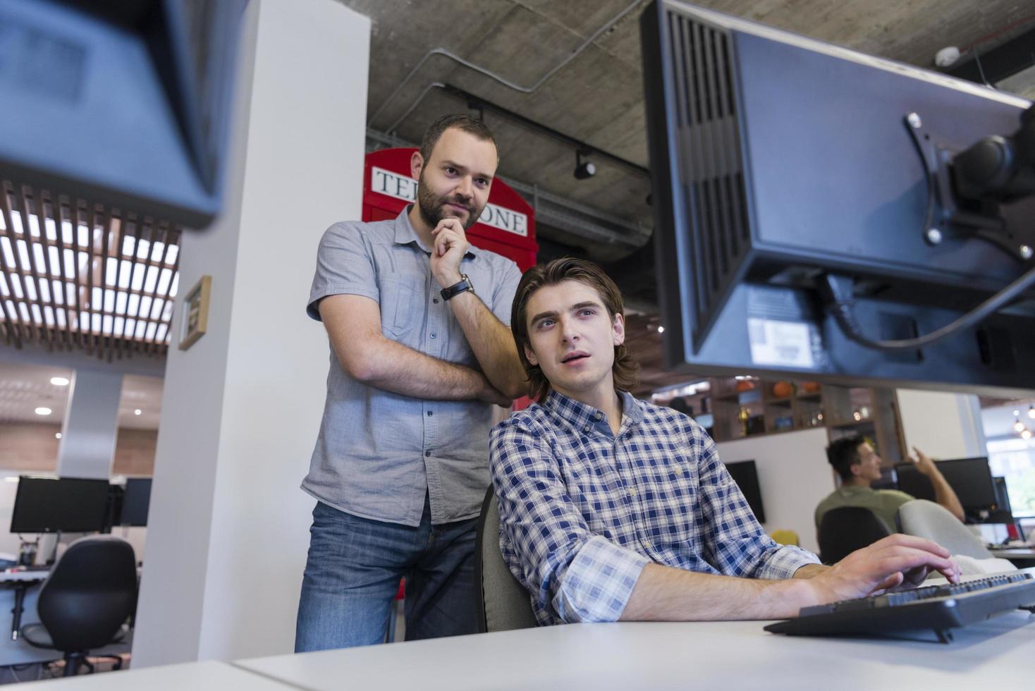 startup business people group working as team to find solution photo