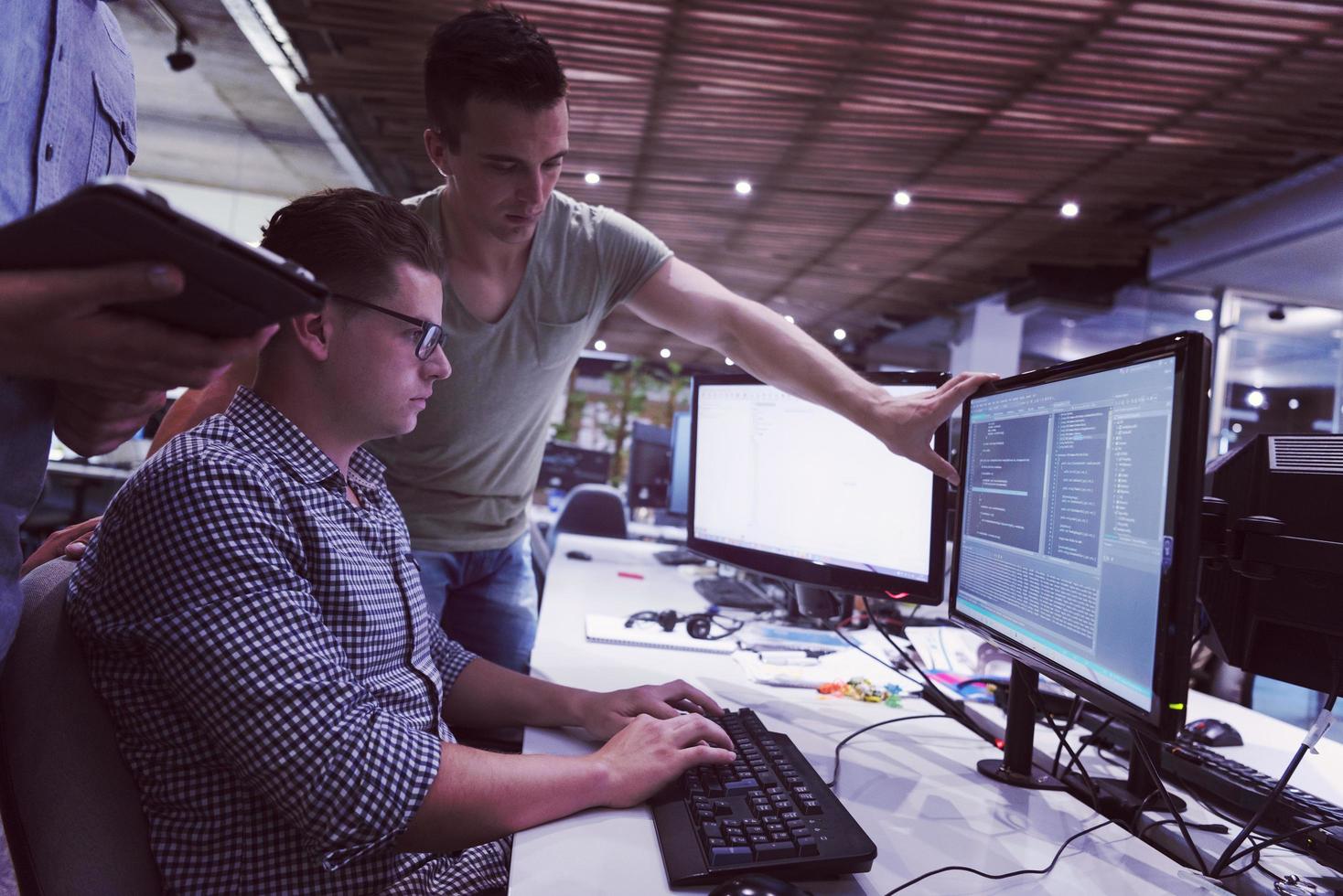 startup business people group working as team to find solution photo