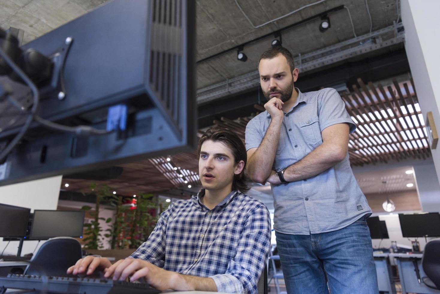 startup business people group working as team to find solution photo