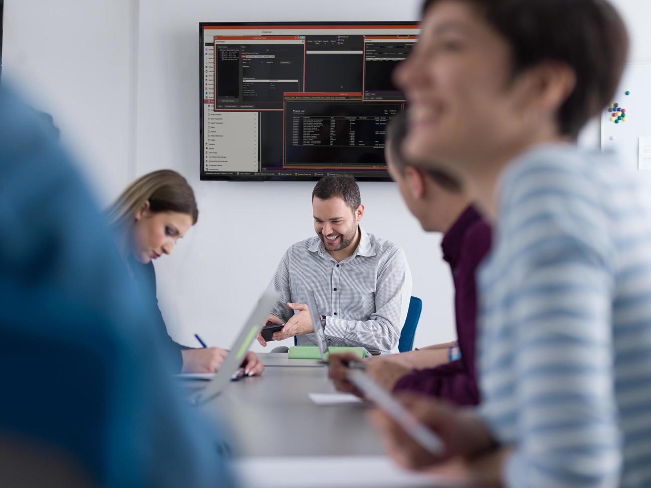 Business Team At A Meeting at modern office building photo