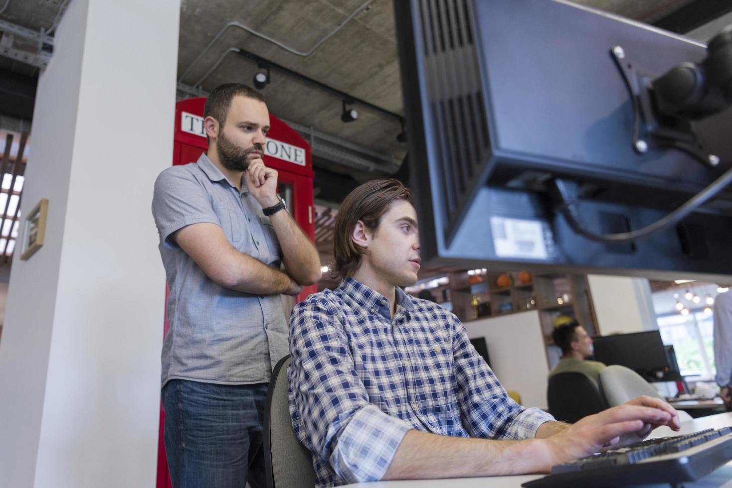 startup business people group working as team to find solution photo