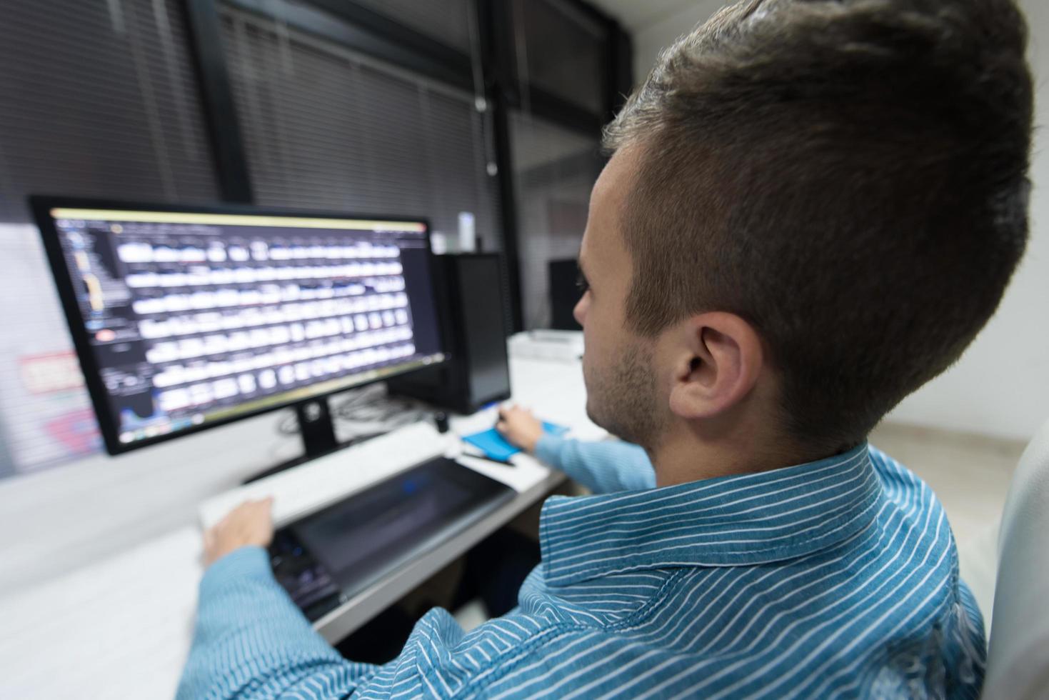 photo editor at his desk