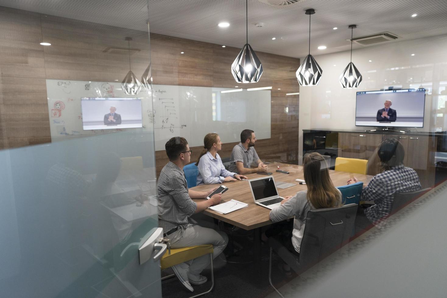 start up business people group attending videoconference call photo