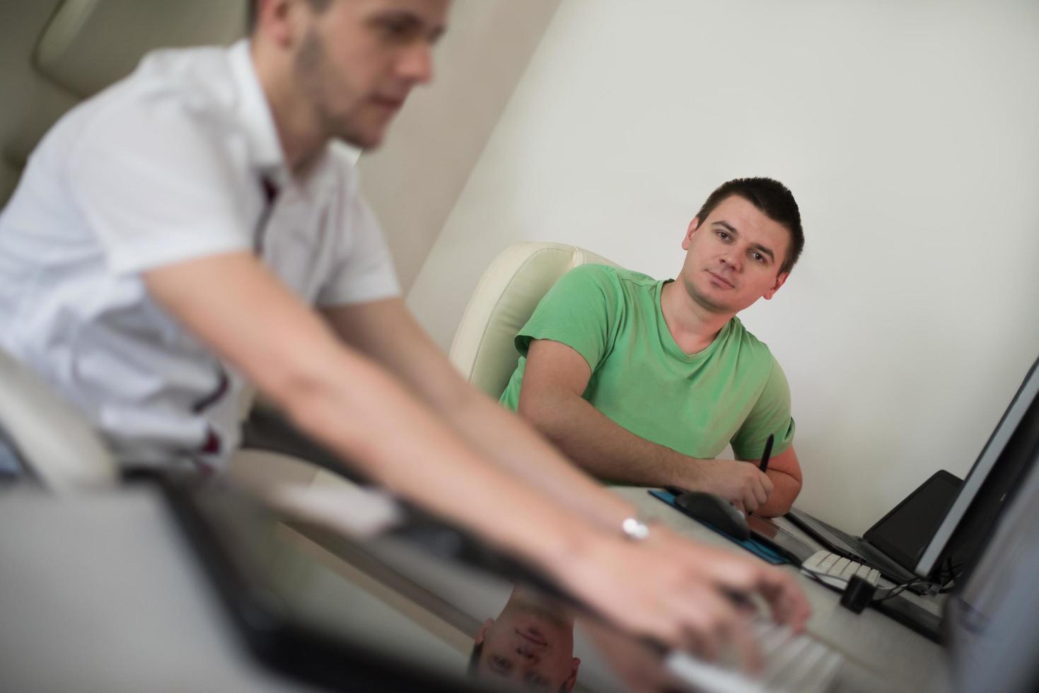 a group of graphic designers at work photo