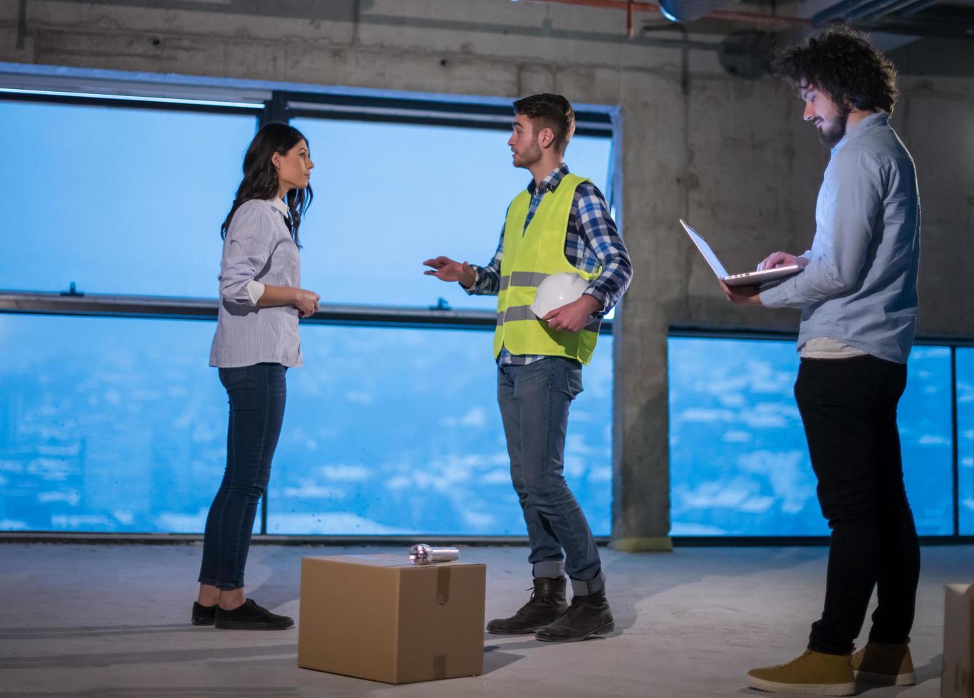 business people in group, architect and engineer on construction site photo