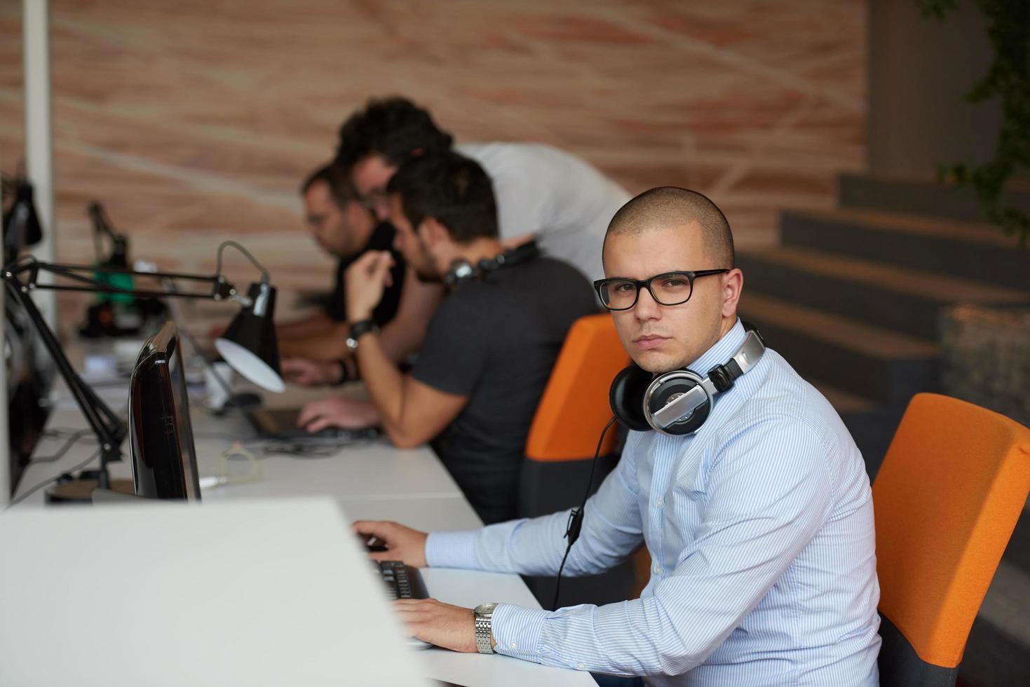 startup business, software developer working on computer photo