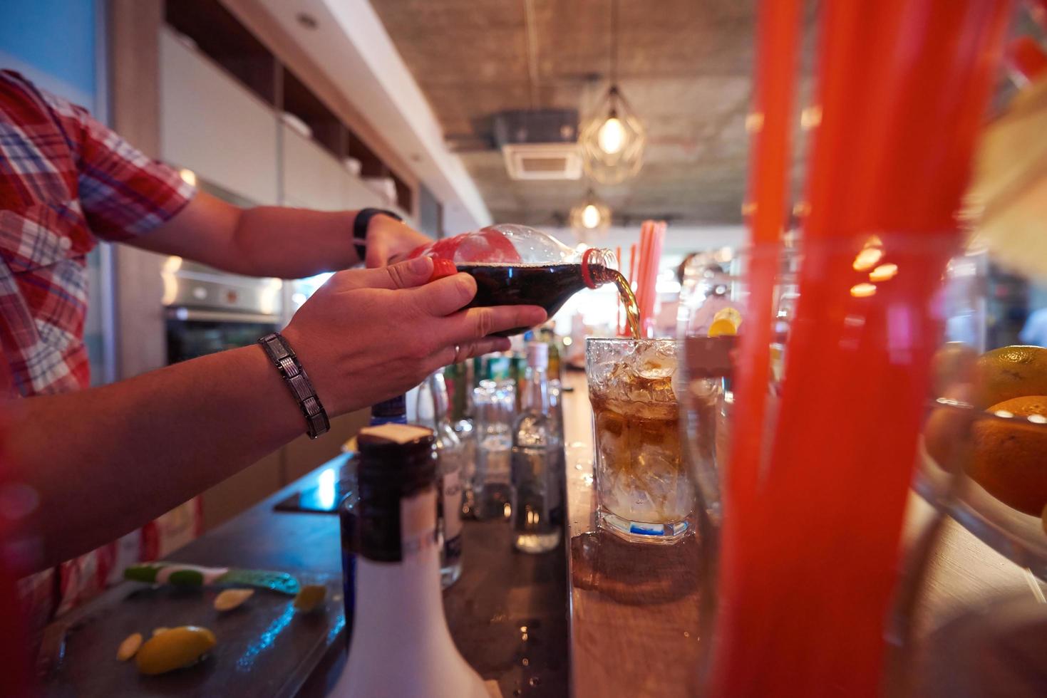 barman prepare fresh coctail drink photo