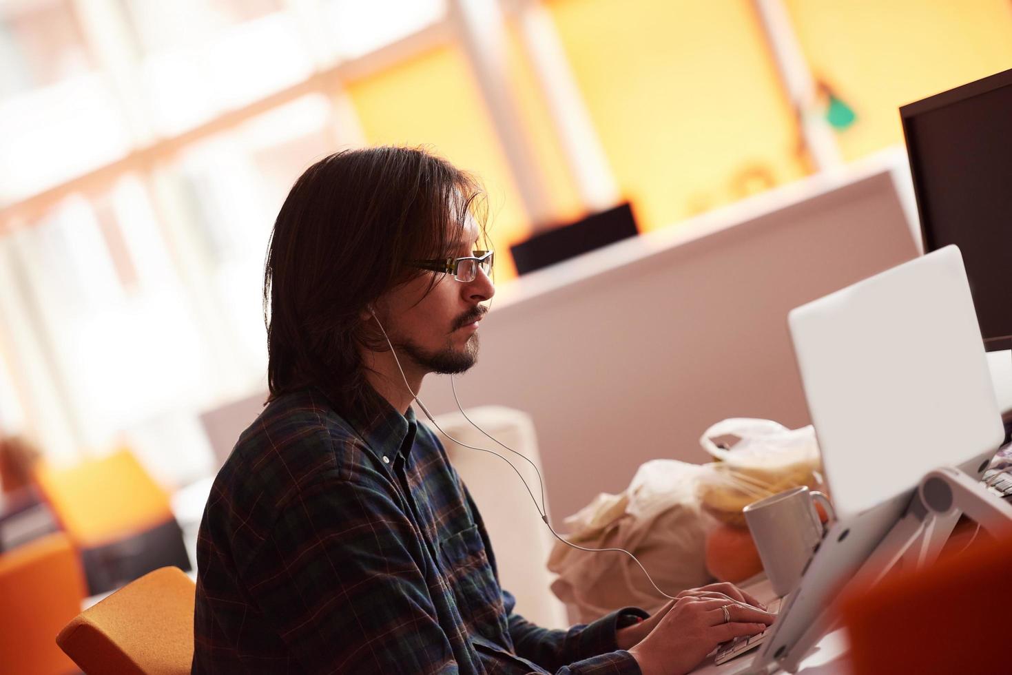 startup business, software developer working on computer photo