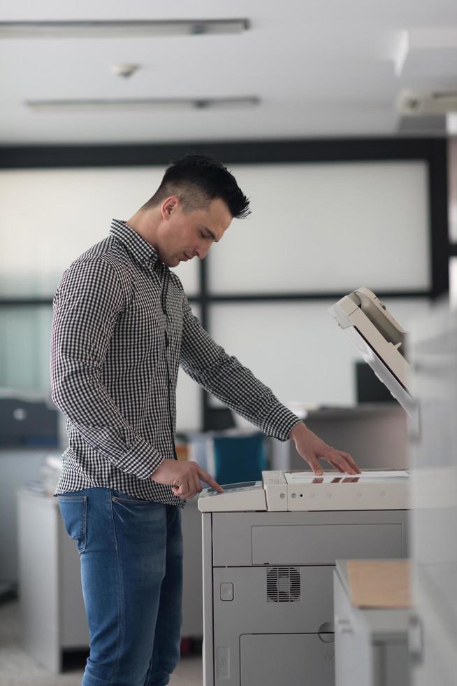 young  business man copy documents photo