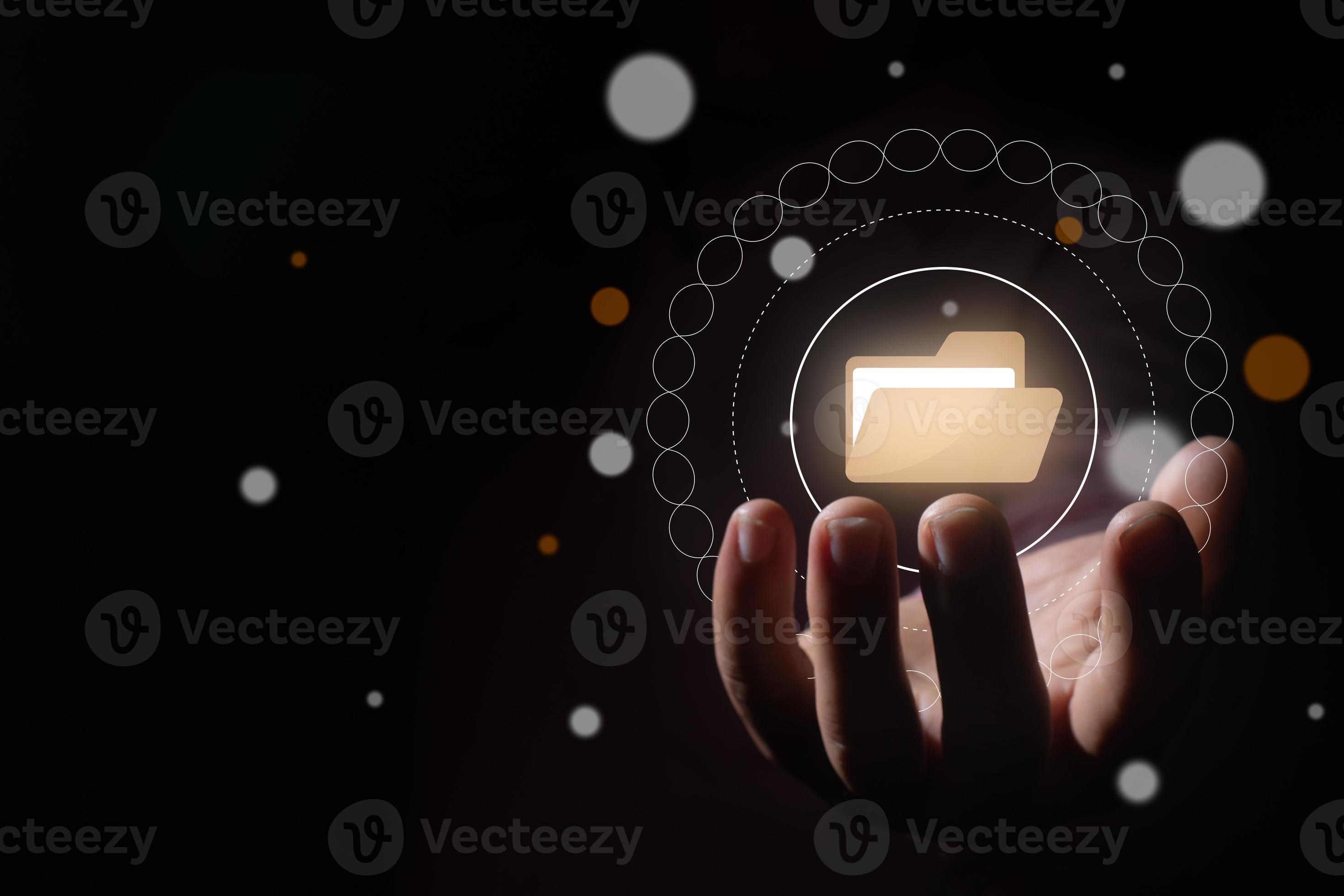 Una mano de negocios sosteniendo una carpeta de icono de archivo bokeh