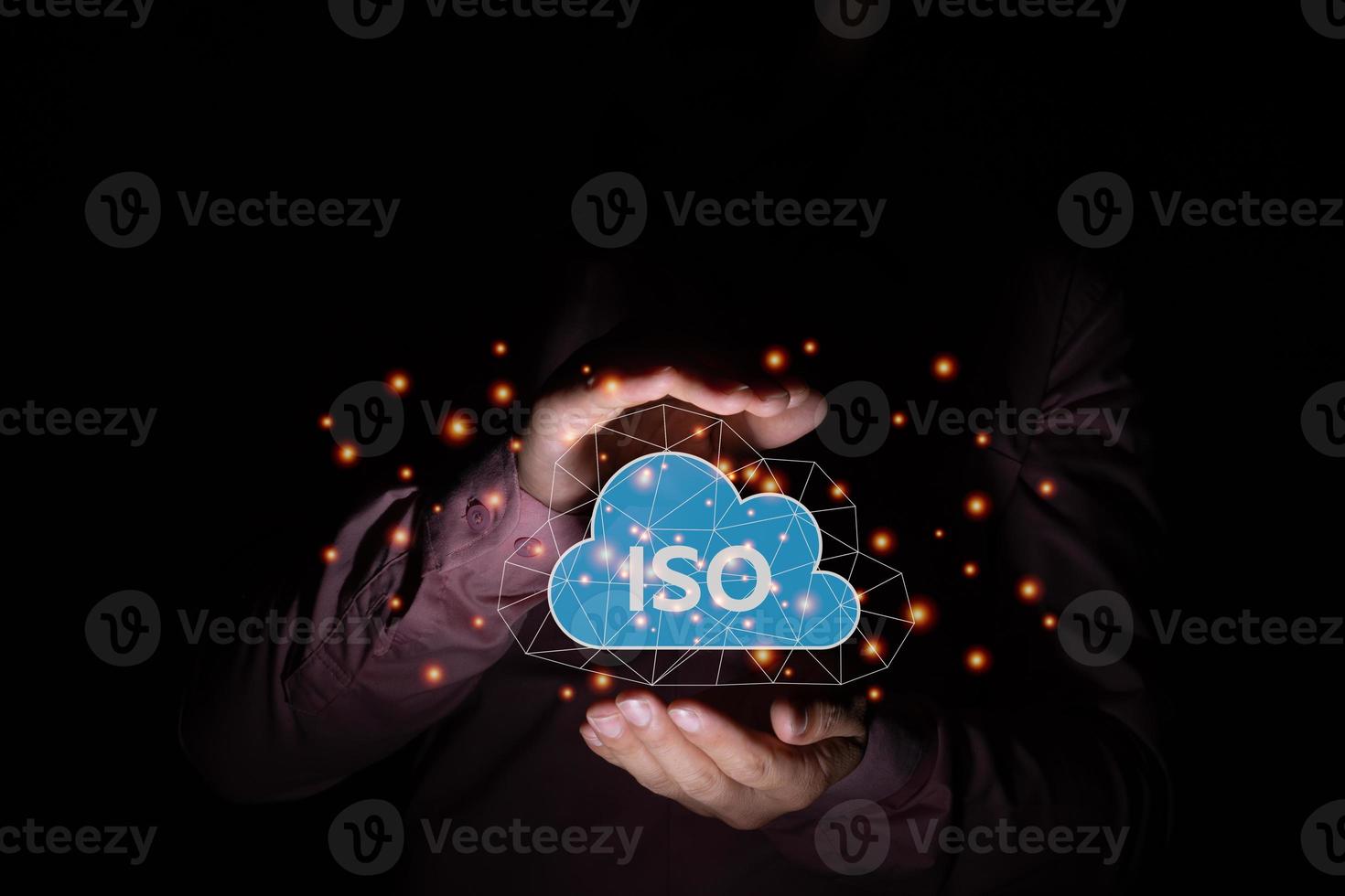 A businessman holding cloud ISO service icon, cloud database graphic light, standard quality document control for organization and industry management products, cloud service for client concept photo