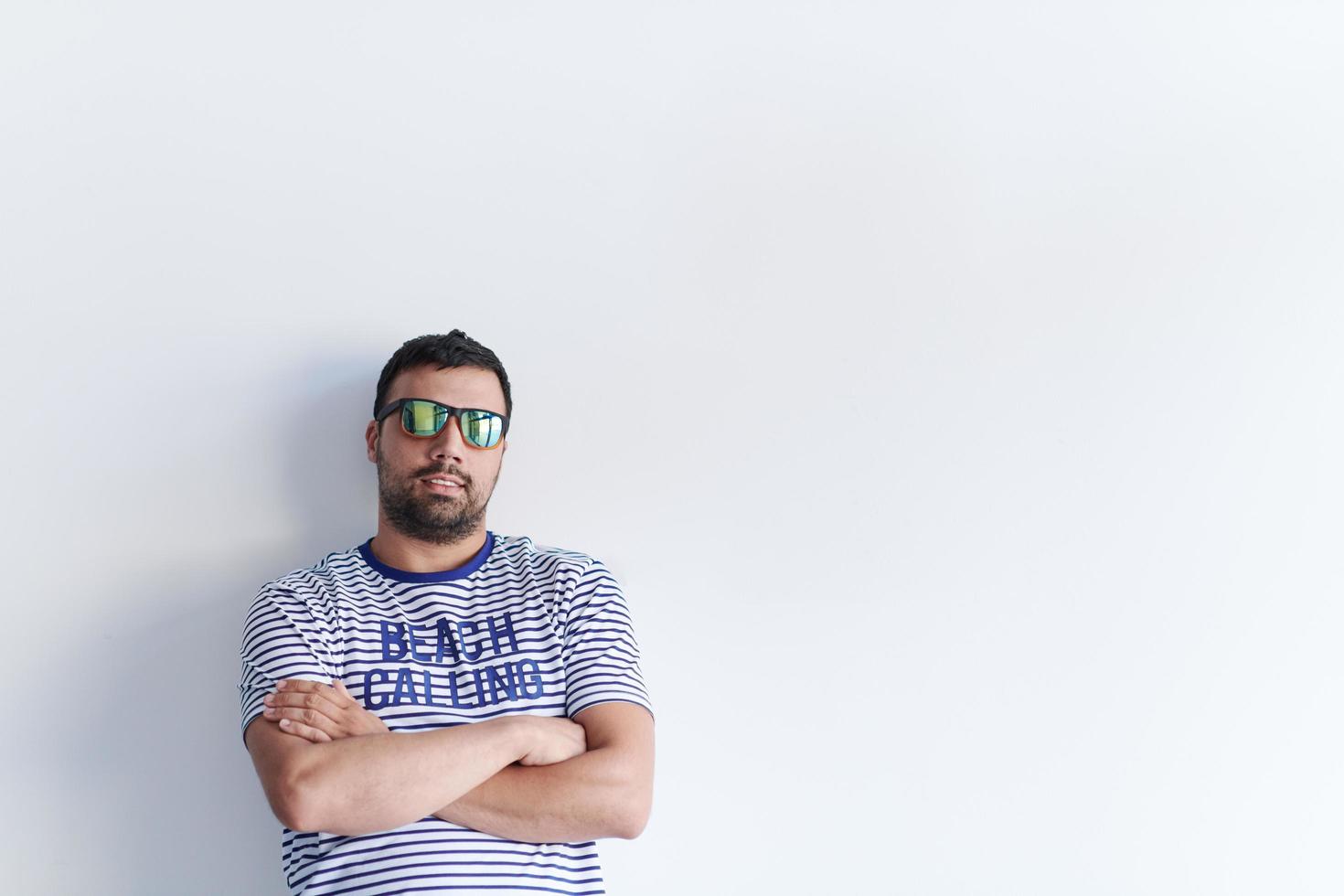 portrait of casual startup businessman wearing sunglasses photo