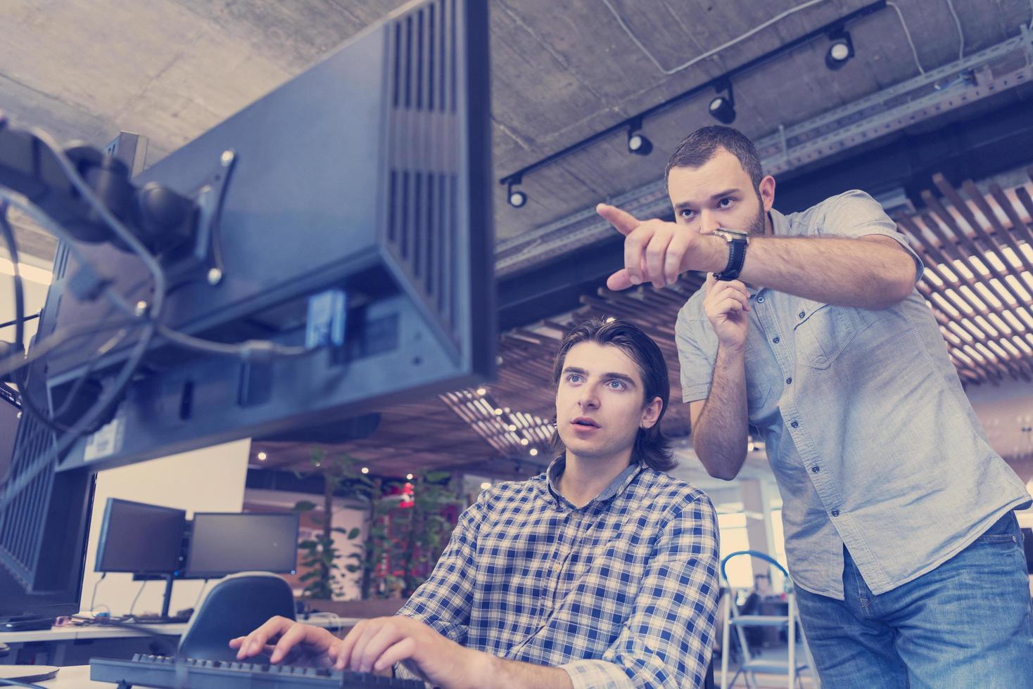 startup business people group working as team to find solution photo