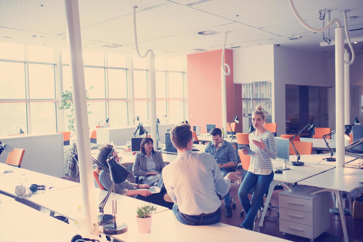 Young Business Team At A Meeting at modern office building photo