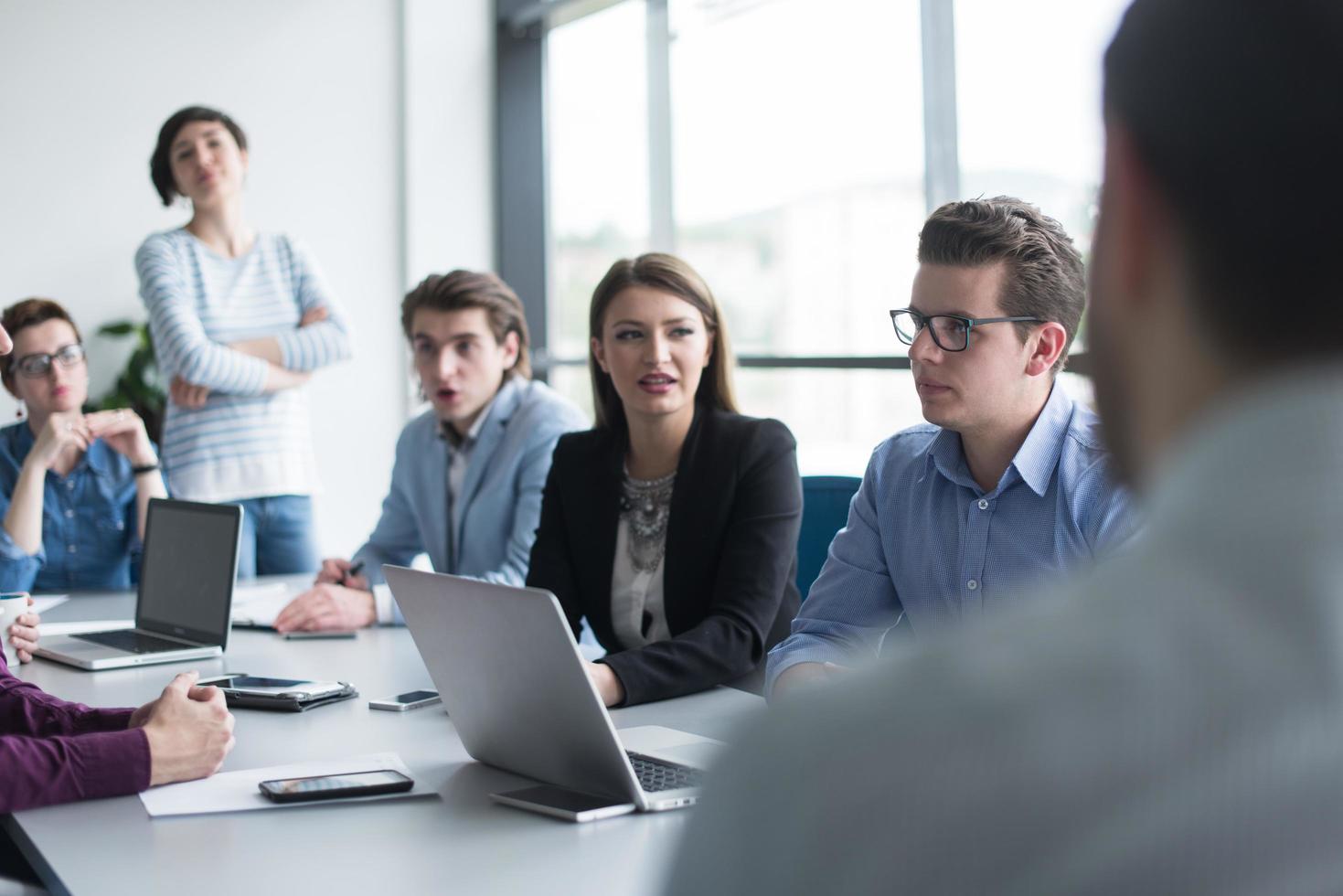 Business Team At A Meeting at modern office building photo