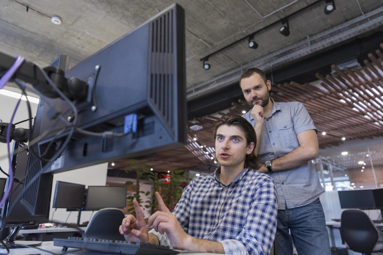 startup business people group working as team to find solution photo